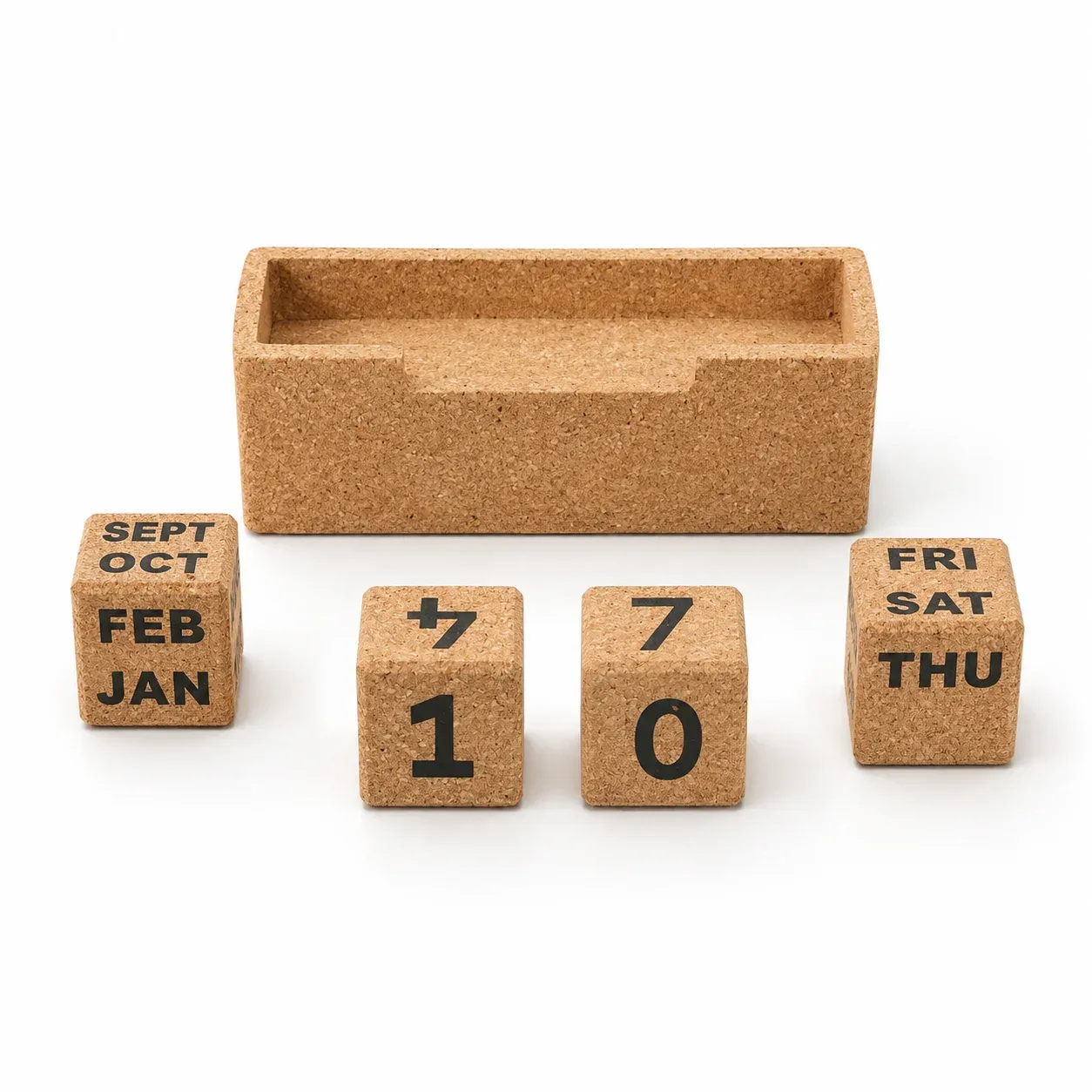 Four separated cork calendar blocks beside the empty slim holder: two numbered cubes, month cube and weekday cube