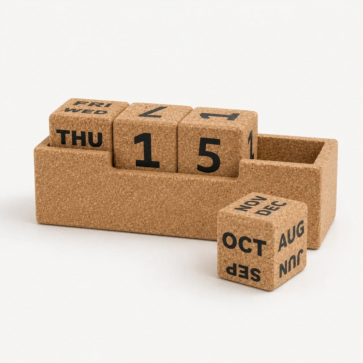 Slim cork block calendar with two date cubes, one month cube and one weekday cube in a cork base