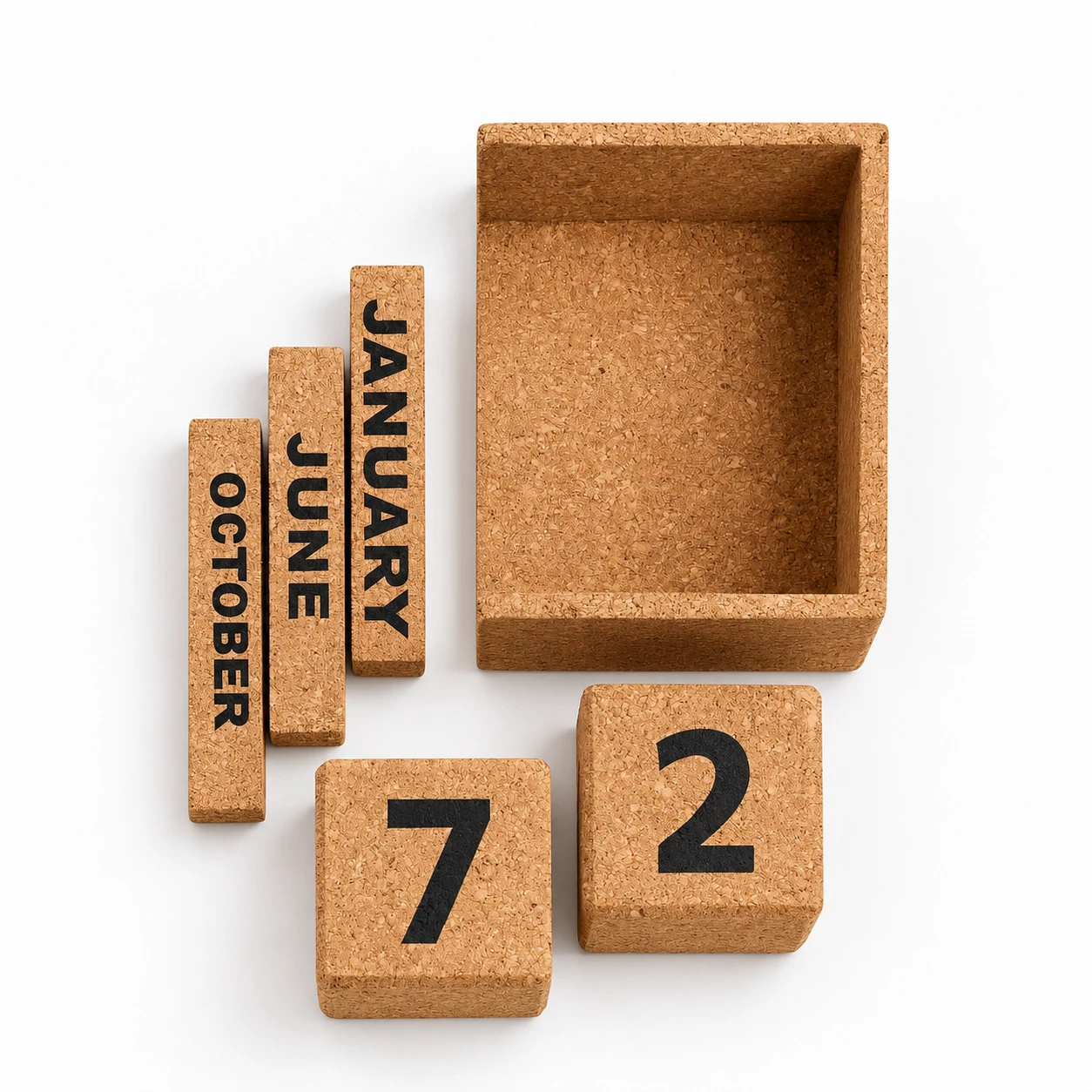 The cork base empty, with the 7 and 2 cubes and the January, June and October blocks beside it